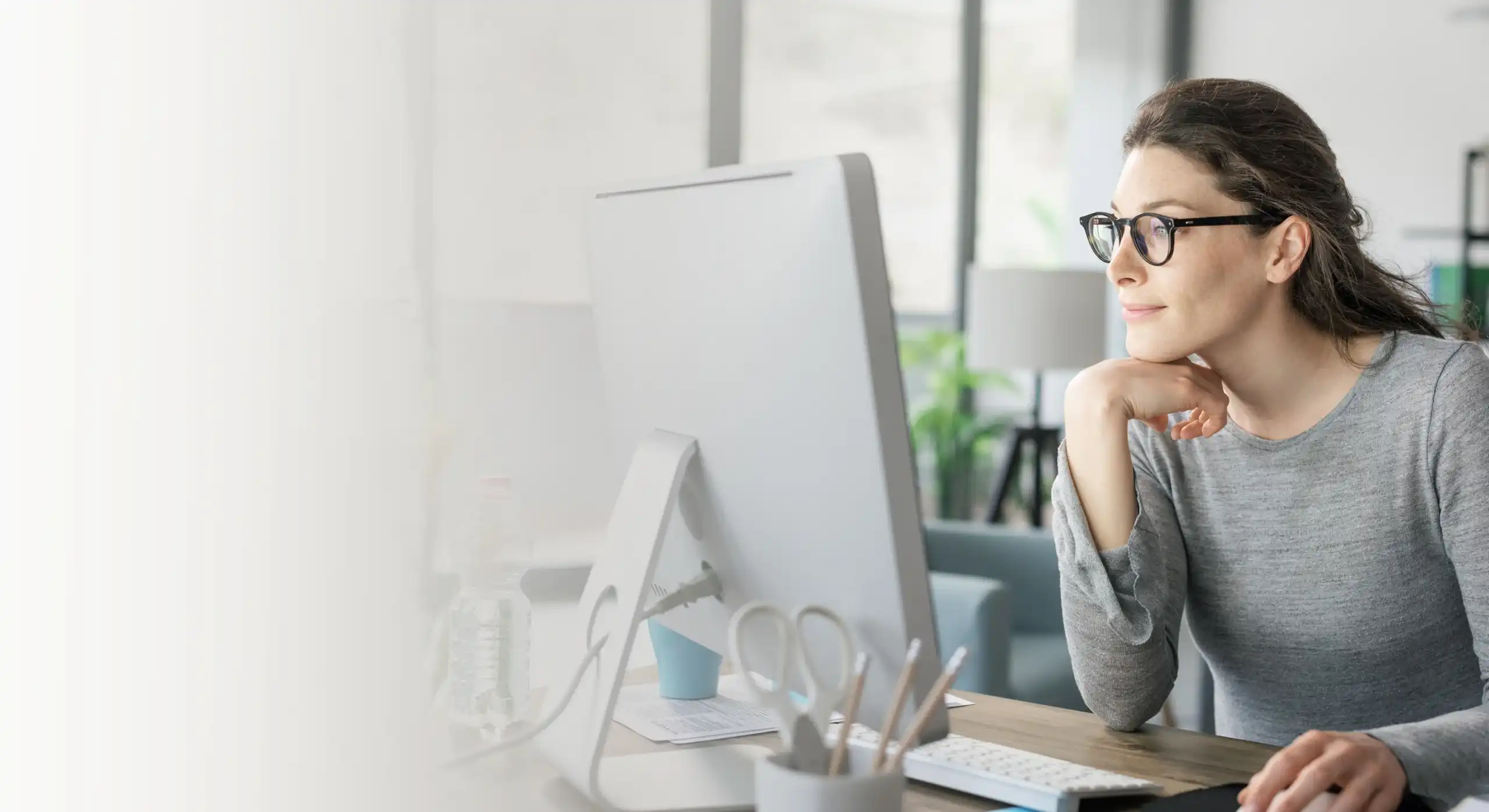 Lady looking at computer